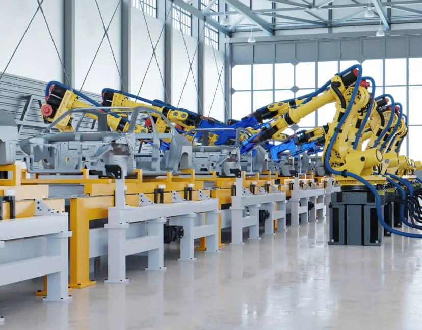 Roboter montieren Fahrzeuge - Automatisierte Montagestraße in Fertigungshalle